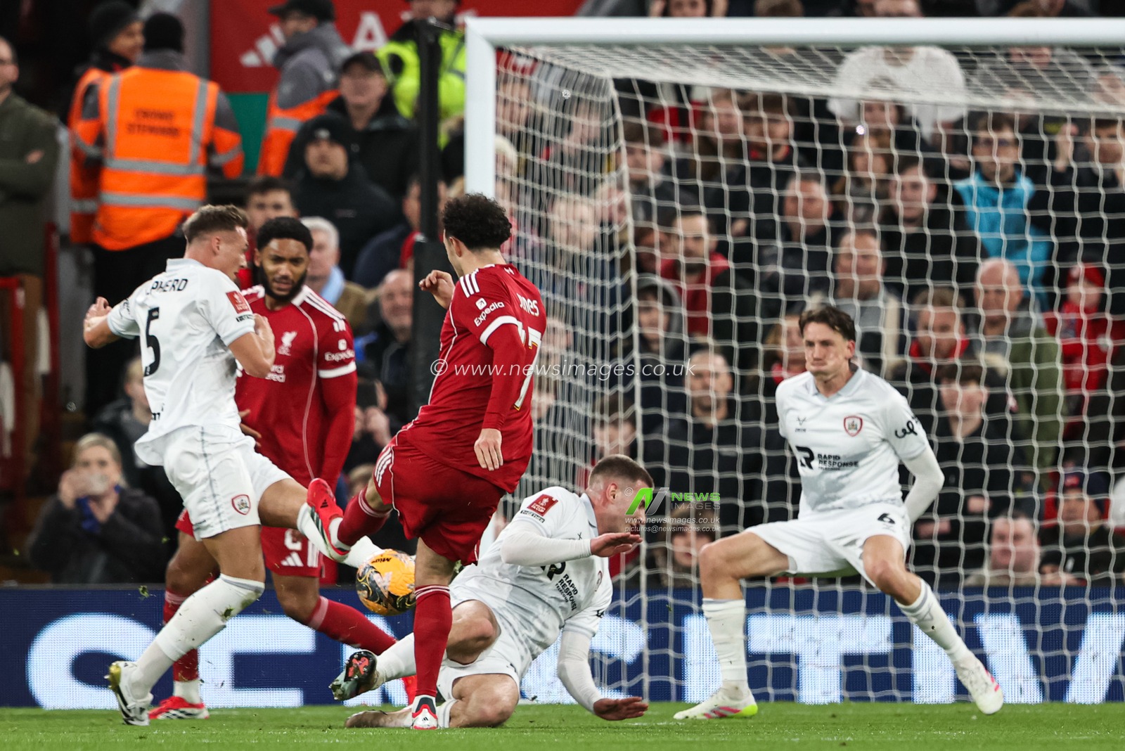 Curtis Jones of Liverpool shoots on goal and watches the ball hit a player and bounce back during the Emirates FA Cup Third Round match Liverpool vs Barnsley at Anfield, Liverpool, United Kingdom, 12th January 2026

(Photo by Alfie Cosgrove/News Images)