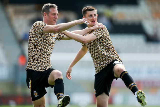 Michael Morrison and Kelland Watts of Cambridge United warm up prior to the Sky Bet League 1 match Cambridge United vs Charlton Athletic at Cledara Abbey Stadium, Cambridge, United Kingdom, 12th April 2025

(Photo by Izzy Poles/News Images)