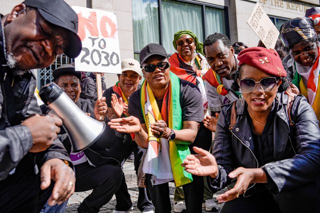 UK-based Zimbabweans gather outside the Zimbabwe Embassy in London on 18 April 2026 to protest the Constitution of Zimbabwe Amendment (No. 3) Bill, which critics say would extend President Mnangagwa’s rule until 2030 and strip citizens of the direct vote for president.

(Photo by Maynard Manyowa/News Images)