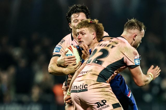 Caius Faatili of Wakefield Trinity is tackled during the Betfred Super League match Wakefield Trinity vs Hull FC at DIY Kitchens Stadium, Wakefield, United Kingdom on 05 March 2026

(Photo by Alfie Cosgrove/News Images)
