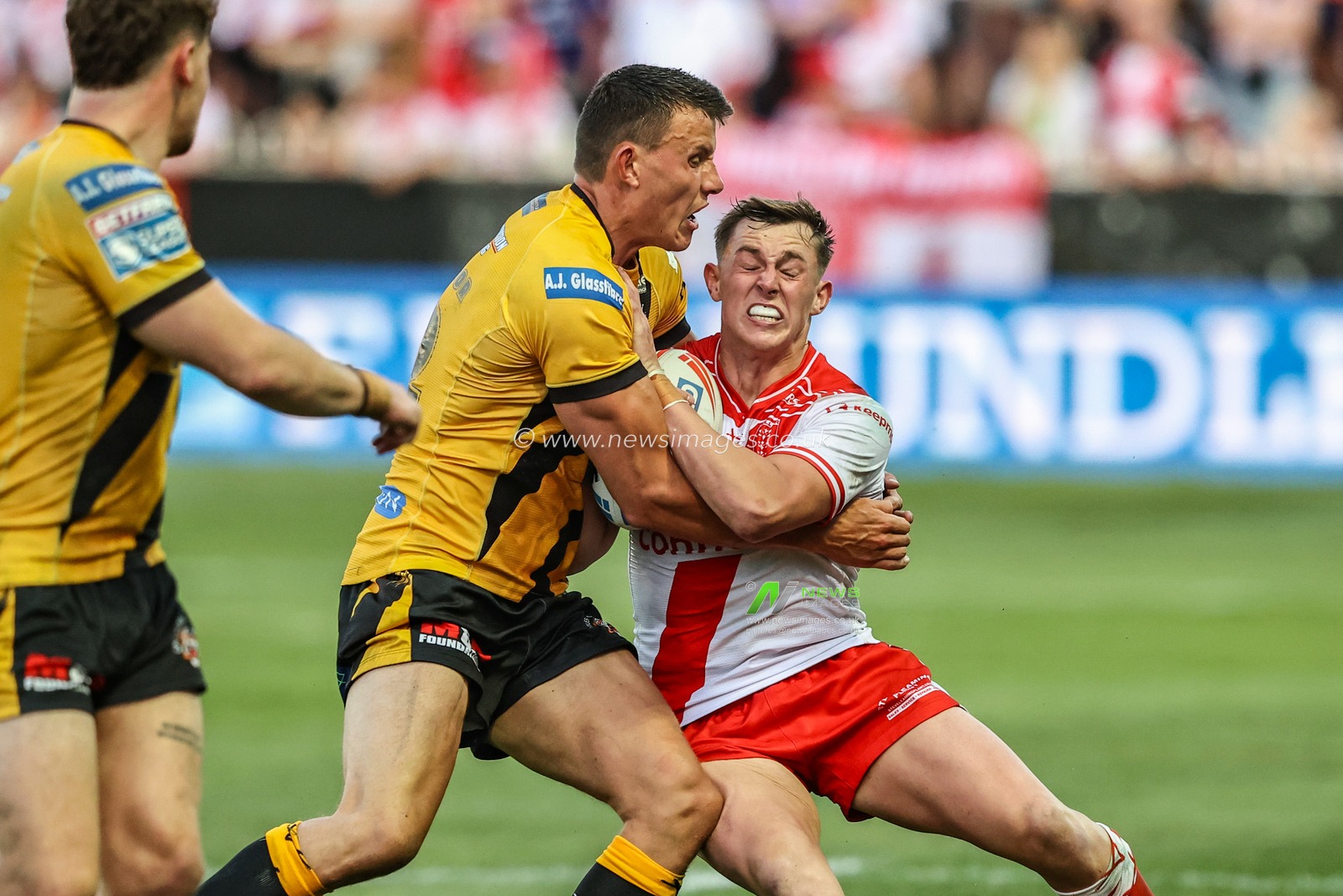 Jack Broadbent of Hull KR is tackled during the Betfred Super League round 15 match Castleford Tigers vs Hull KR at The Mend-A-Hose Jungle, Castleford, United Kingdom, 19th June 2025

(Photo by Alfie Cosgrove/News Images)