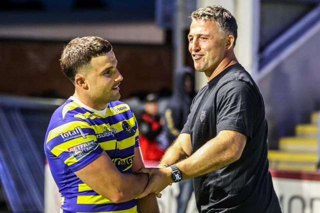 Josh Smith of Warrington Wolves shakes hands with Sam Burgess manager of Warrington after the game during the Betfred Super League round 13 match Warrington Wolves vs Hull FC at The Halliwell Jones Stadium, Warrington, United Kingdom on 05 June 2026

(Photo by Alfie Cosgrove/News Images)