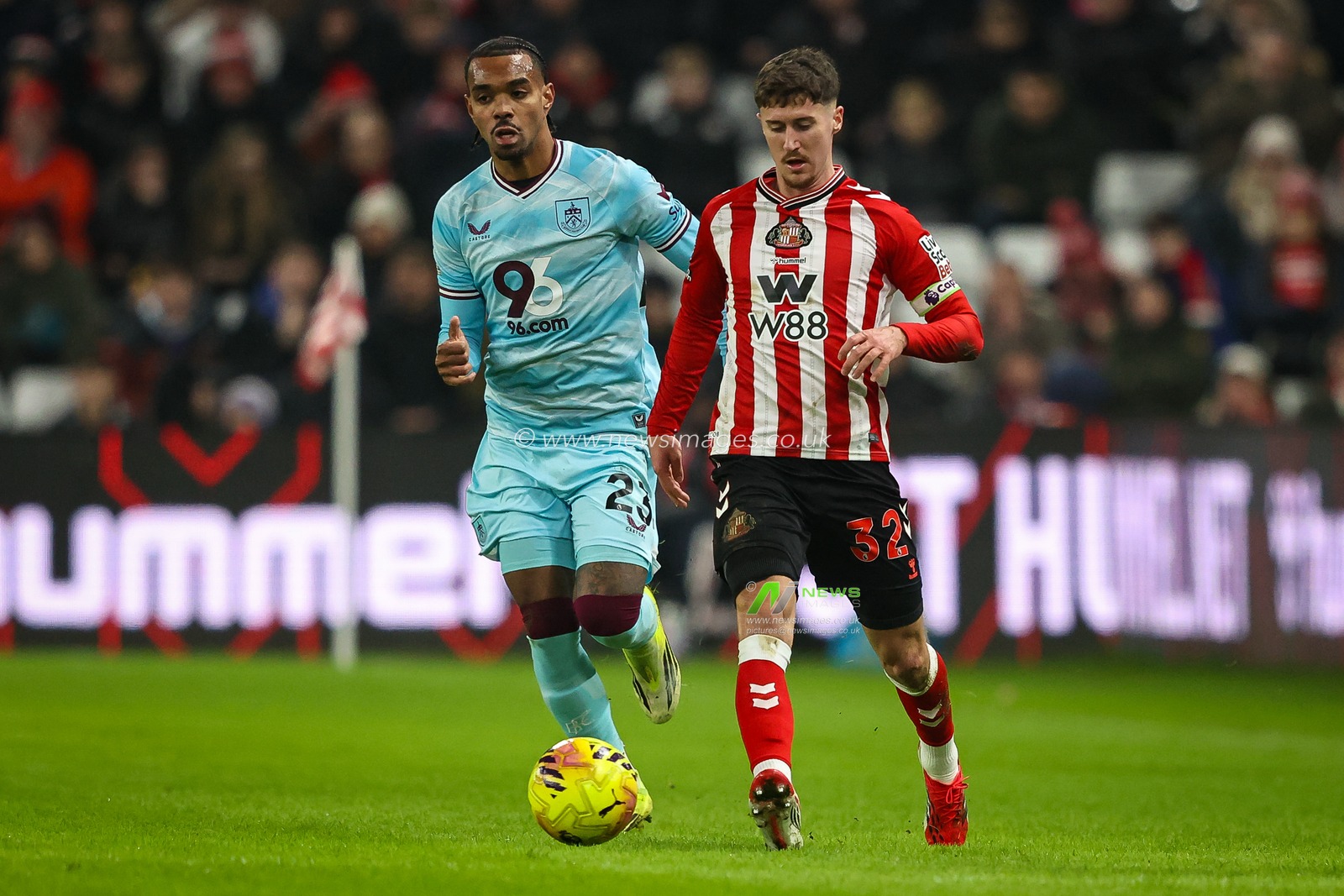 Trai Hume of Sunderland makes a run with the ball while chased by Lucas Pires of Burnley during the Premier League match Sunderland vs Burnley at Stadium Of Light, Sunderland, United Kingdom, 2nd February 2026

(Photo by Alfie Cosgrove/News Images)
