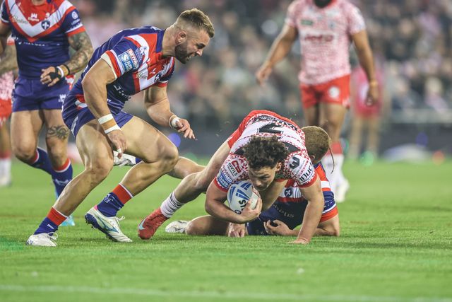 Lachlan Lam of Leigh Leopards is tackled during the Betfred Super League play-off Eliminator 1 match Leigh Leopards vs Wakefield Trinity at Progress With Unity Stadium, Leigh, United Kingdom, 26th September 2025

(Photo by Alfie Cosgrove/News Images)