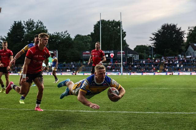 Lachlan Miller of Leeds Rhinos goes over for a try during the Betfred Super League round 19 match Leeds Rhinos vs Salford Red Devils at Headingley Stadium, Leeds, United Kingdom, 18th July 2025

(Photo by Alfie Cosgrove/News Images)