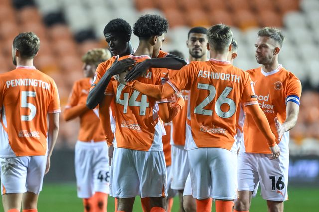 Takudzwa Gwanzura of Blackpool is by his team mates after he missed his penalty during the Bristol Street Motors Trophy match Blackpool vs Liverpool U21 at Bloomfield Road, Blackpool, United Kingdom, 6th November 2024

(Photo by Craig Thomas/News Images)