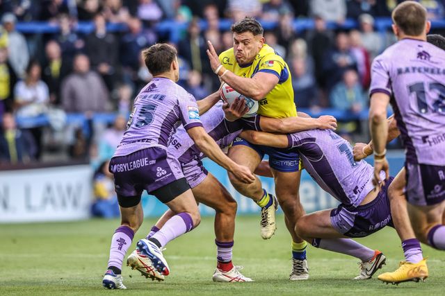 Joe Philbin of Warrington Wolves is tackled during the Betfred Super League Round 12 match Warrington Wolves vs Hull KR at Halliwell Jones Stadium, Warrington, United Kingdom, 23rd May 2025

(Photo by Alfie Cosgrove/News Images)