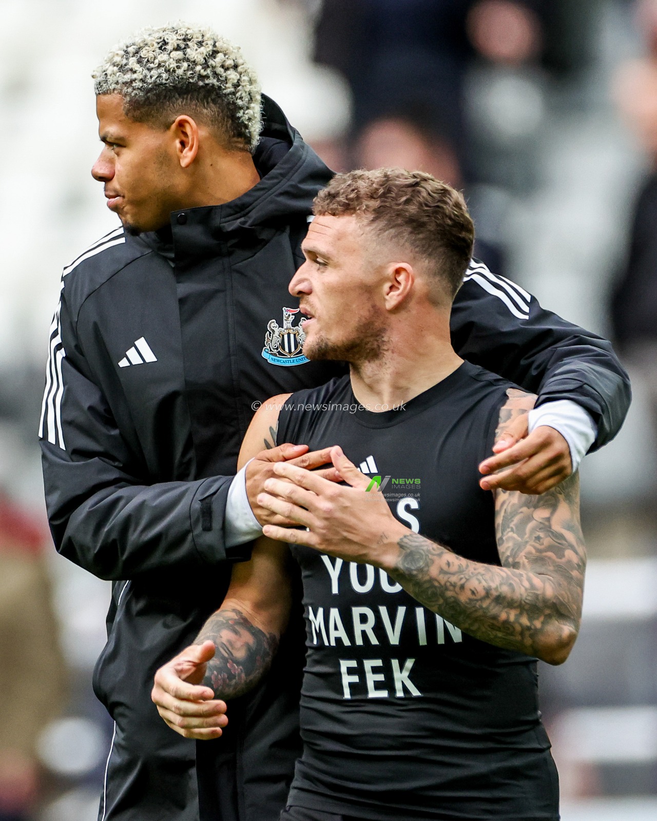 William Osula and Kieran Trippier of Newcastle United acknowledges the fans after the teams victory following the Premier League match Newcastle United vs Manchester United at St. James's Park, Newcastle, United Kingdom, 13th April 2025

(Photo by Mark Cosgrove/News Images)