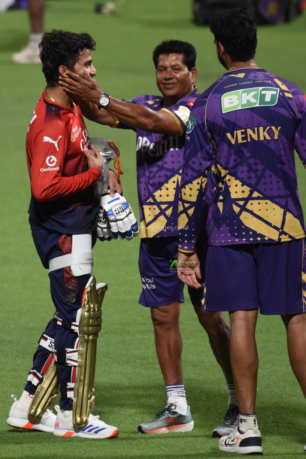 Royal Challengers Bengaluru's (RCB) captain Rajat Patidar, left, with Kolkata Knight Riders' (KKR) Venkatesh Iyer, right, and coach Chandrakant Pandit at the a practice session ahead of an Indian Premier League (IPL) 2025 T20 cricket match between Kolkata Knight Riders and Royal Challengers Bengaluru, at the Eden Gardens Cricket Stadium in Kolkata,India, Friday, March 21, 2025.Pictures by Debajyoti Chakraborty.(Photo: Debajyoti Chakraborty/News Images)