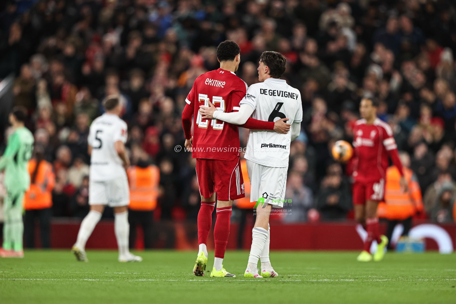 Hugo Ekitike of Liverpool embraces Mael de Gevigney of Barnsley after the Emirates FA Cup Third Round match Liverpool vs Barnsley at Anfield, Liverpool, United Kingdom, 12th January 2026

(Photo by Alfie Cosgrove/News Images)