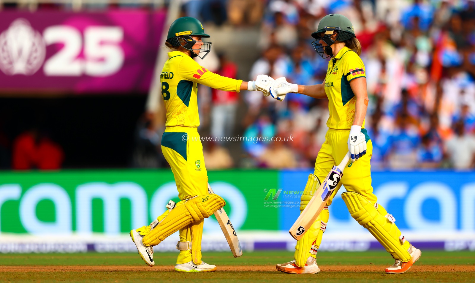 Phoebe Litchfield of Australia and Ellyse Perry of Australia during the ICC Women's ODI Cricket World Cup Semi Final match India vs Australia at Dr. D.Y. Patil Sports Academy, Navi Mumbai, India, 30th October 2025

(Photo by Shubhajit Roy Karmakar/News Images)