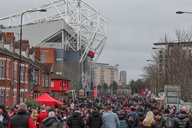 Manchester United fans make their way to Old Trafford during the Premier League match Manchester United vs Fulham at Old Trafford, Manchester, United Kingdom, 1st February 2026

(Photo by Mark Cosgrove/News Images)