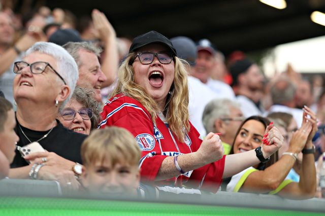 Wakefield fans celebrate the try scored by Caius Faatili of Wakefield Trinity during the Betfred Super League round 15 match Wakefield Trinity vs Wigan Warriors at DIY Kitchens Stadium, Wakefield, United Kingdom, 20th June 2025

(Photo by Sam Eaden/News Images)