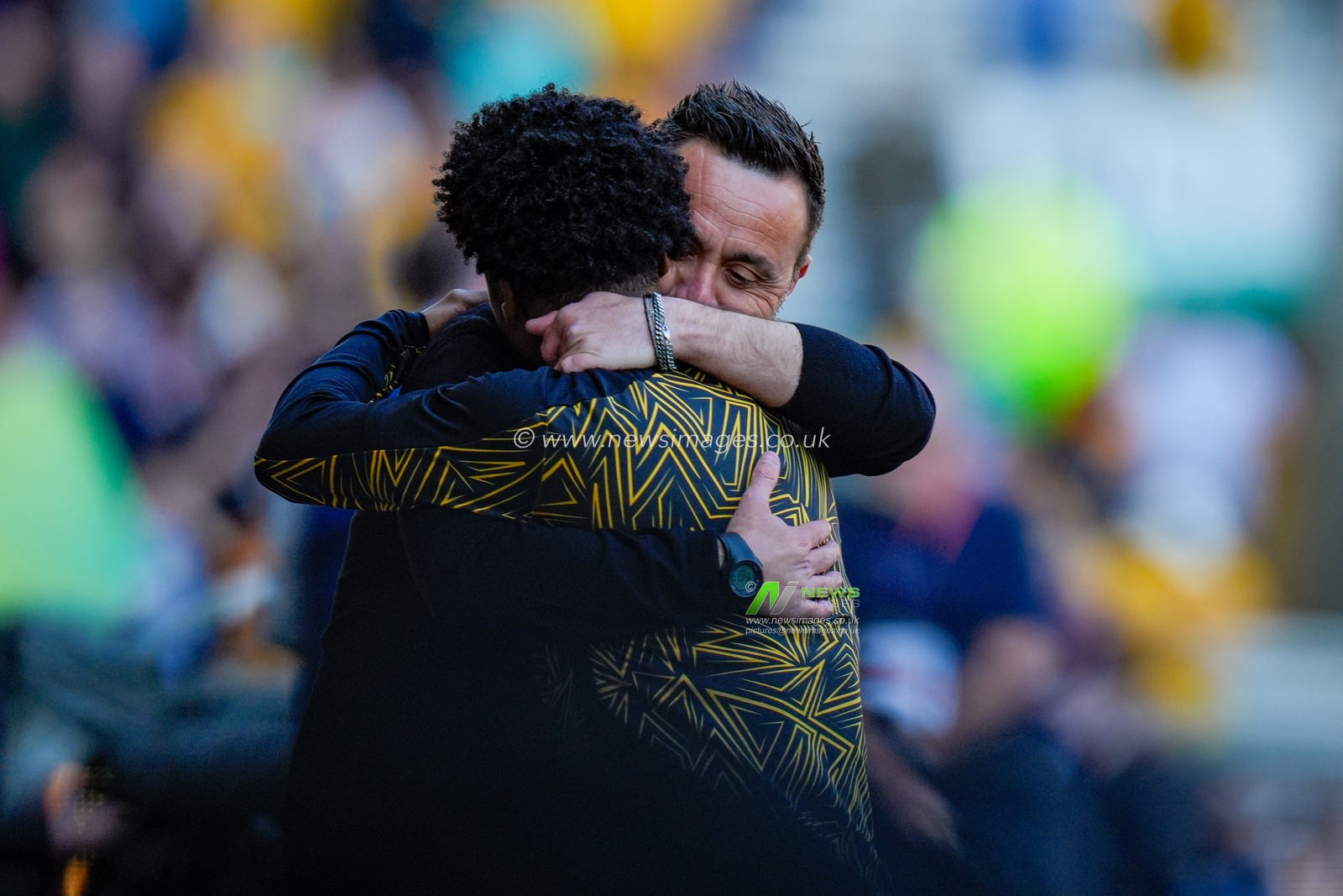 Roberto De Zerbi manager of Tottenham Hotspur smiles and greets former player Angel Gomes of Wolverhampton Wanderers during the Premier League match Wolverhampton Wanderers vs Tottenham Hotspur at Molineux, Wolverhampton, United Kingdom on 25 April 2026

(Photo by Maynard Manyowa/News Images)
