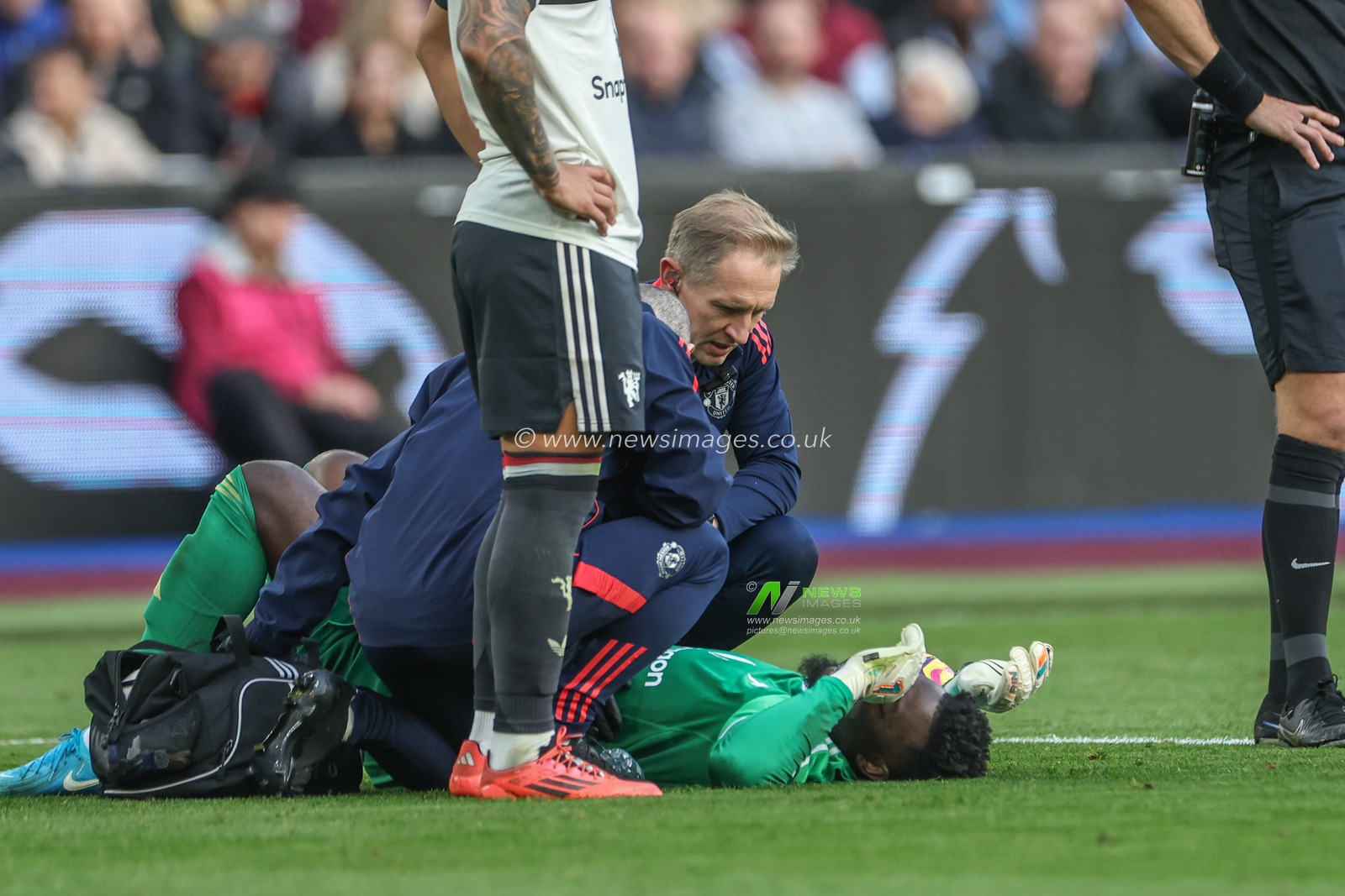 AndrÃ© Onana of Manchester United receives treatment during the Premier League match West Ham United vs Manchester United at London Stadium, London, United Kingdom, 27th October 2024

(Photo by Mark Cosgrove/News Images)