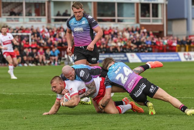 Mikey Lewis of Hull KR is tackled by Zak Hardaker of Hull F.C. during the Betfred Super League round 7 match Hull KR vs Hull FC at Sewell Group Craven Park, Hull, United Kingdom on 03 April 2026

(Photo by Mark Cosgrove/News Images)