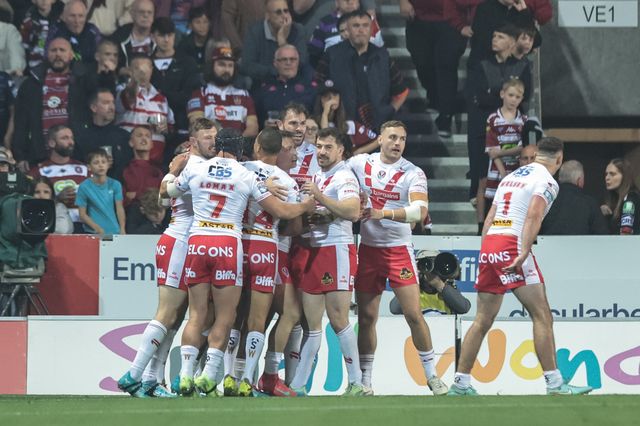Deon Cross celebrates his try with team mates during the Betfred Super League Round 25 match St Helens vs Wigan Warriors at Totally Wicked Stadium, St Helens, United Kingdom, 5th September 2025

(Photo by Mark Cosgrove/News Images)