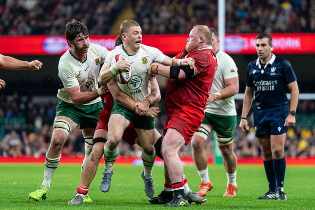 Morne van den Berg of South Africa is tackled by Keiron Assiratti of Wales during the Quilter Nations Series 2025 match Wales vs South Africa at Principality Stadium, Cardiff, United Kingdom, 29th November 2025

(Photo by Andrew Lewis/News Images)

*** GER AUT SUI OUT ***
