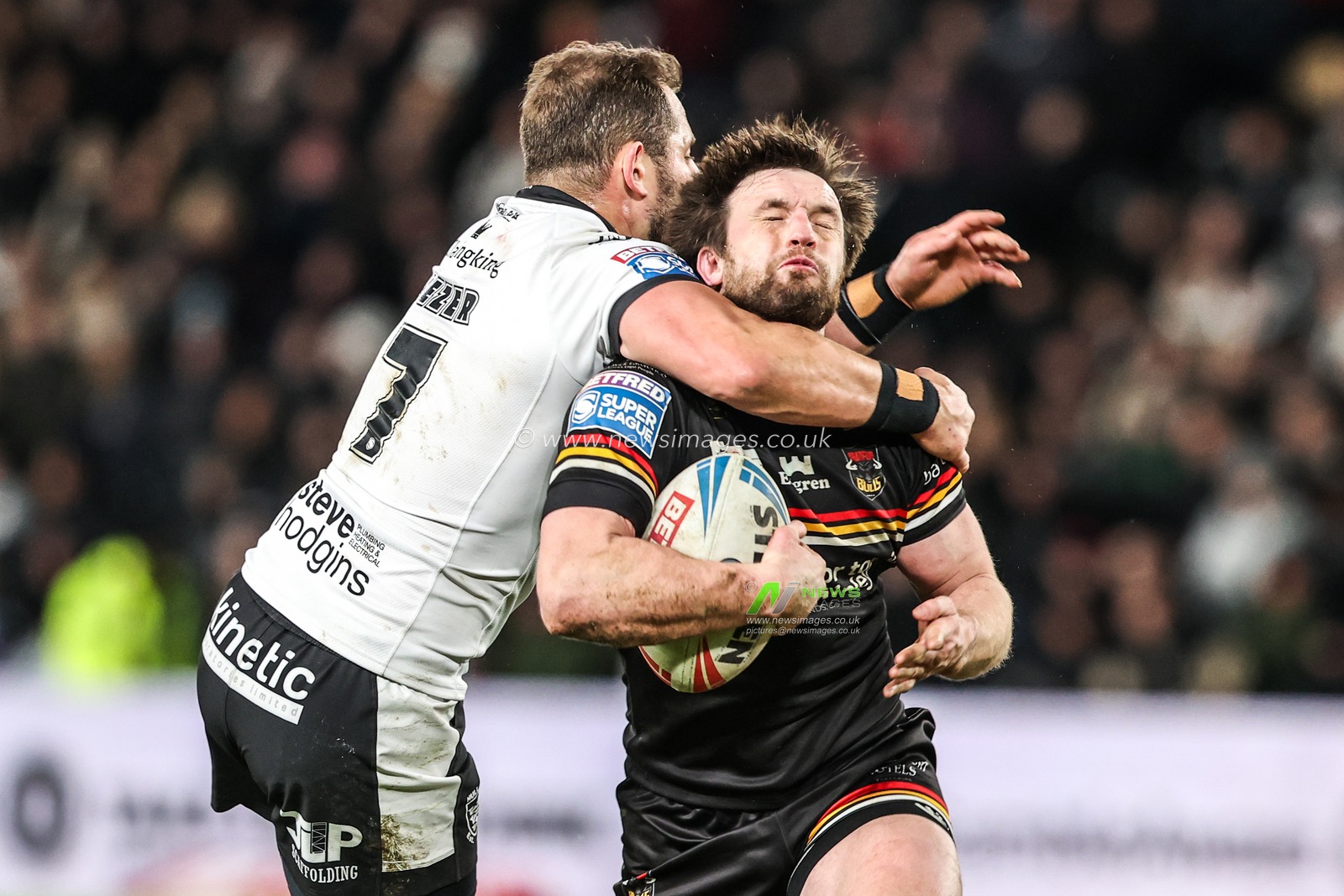 Joe Mellor of Bradford Bulls is tackled by the neck by Aidan Sezer of Hull FC during the Betfred Super League round 1 match Hull FC vs Bradford Bulls at MKM Stadium, Hull, United Kingdom on 14 February 2026

(Photo by Alfie Cosgrove/News Images)