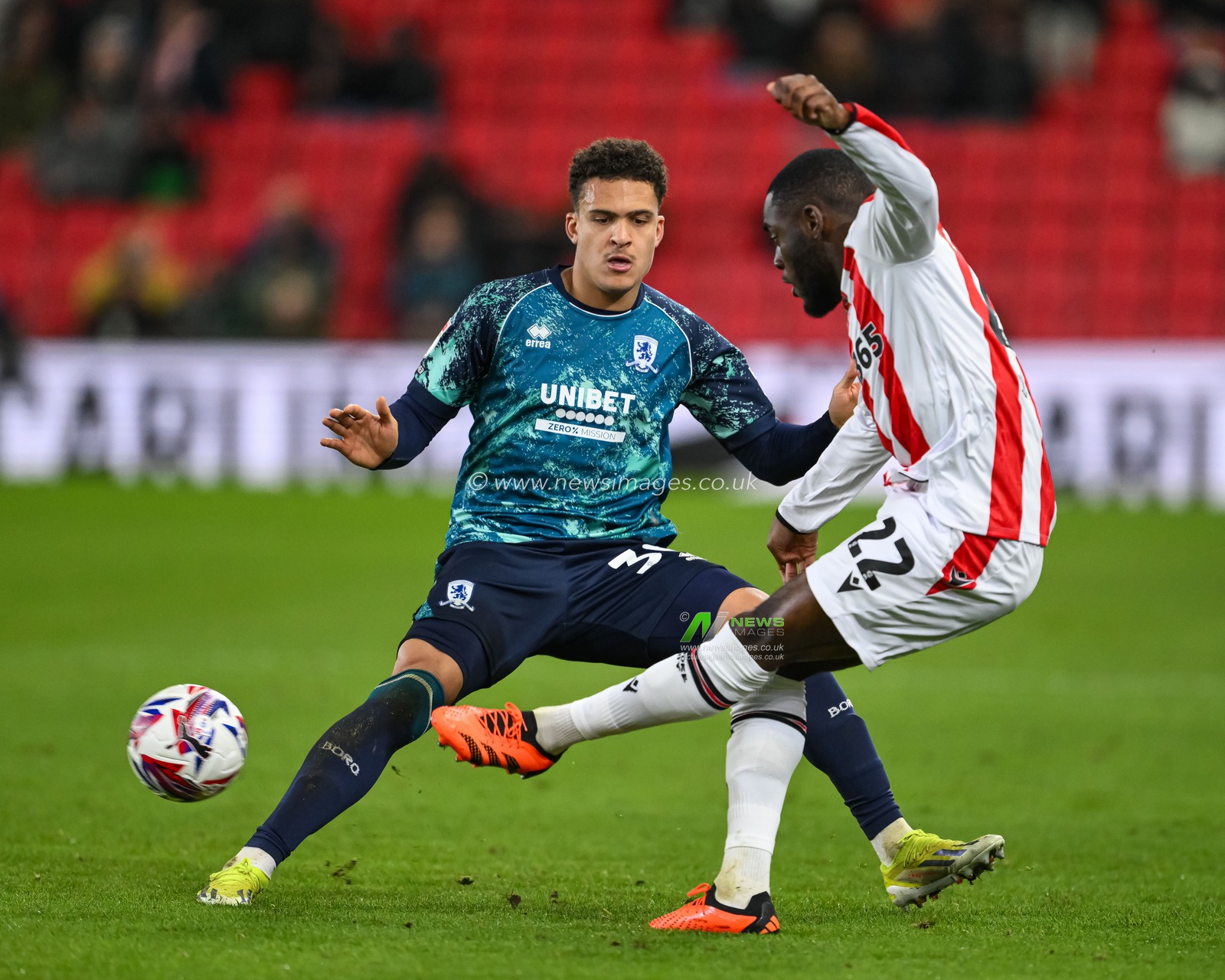 Junior Tchamadeu of Stoke City clips the ball past Neto Borges of Middlesbrough during the Sky Bet Championship match Stoke City vs Middlesbrough at Bet365 Stadium, Stoke-on-Trent, United Kingdom, 25th February 2025

(Photo by Craig Thomas/News Images)