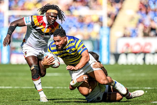 Kelepi Tanginoa of Warrington Wolves is tackled by Jayden Nikorima of Bradford Bulls during the Betfred Super League round 12 match Warrington Wolves vs Bradford Bulls at The Halliwell Jones Stadium, Warrington, United Kingdom on 24 May 2026

(Photo by Alfie Cosgrove/News Images)