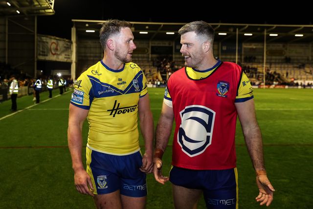 Ben Currie of Warrington Wolves and Lachlan Fitzgibbon of Warrington Wolves the Betfred Super League Round 9 match Warrington Wolves vs St Helens at Halliwell Jones Stadium, Warrington, United Kingdom, 24th April 2025

(Photo by Gareth Evans/News Images)