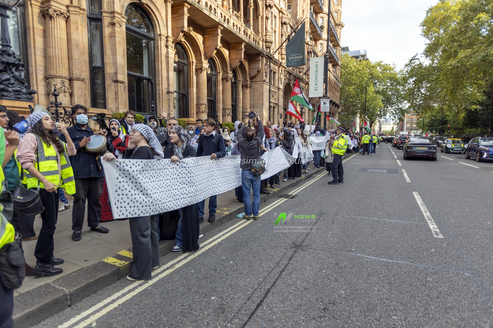 Students from across Londonâ€™s major universities â€” including Kingâ€™s College London (KCL), London School of Economics (LSE), University College London (UCL), and the School of Oriental and African Studies (SOAS) â€” took to the streets for an Inter-University March demanding accountability from UK higher education institutions for what they described as complicity in the ongoing Israeli genocide of the Palestinian people.
Participants gathered for speeches and chants before marching through central London campuses, culminating in a rally outside SOAS, where speakers called for universities to divest from companies supplying weapons to Israel and to stand in solidarity with Palestine.

(Photo by Abdullah Bailey/News Images)