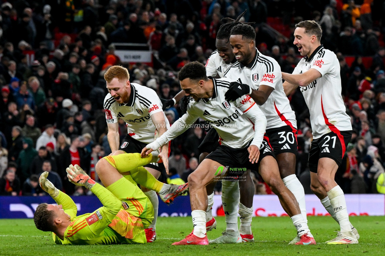 Bernd Leno of Fulham celebrates with teammates after winning on penalties during the Emirates FA Cup 5th Round match Manchester United vs Fulham at Old Trafford, Manchester, United Kingdom, 2nd March 2025

(Photo by Craig Thomas/News Images)