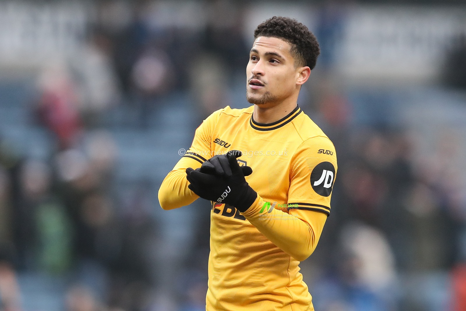 JoÃ£o Gomes of Wolverhampton Wanderers applauds the travelling fans after the Emirates FA Cup Fourth Round Blackburn Rovers vs Wolverhampton Wanderers at Ewood Park, Blackburn, United Kingdom, 9th February 2025

(Photo by Gareth Evans/News Images)