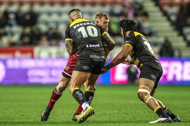 Luke Thompson of Wigan Warriors is tackled by Paul Vaughan of York Knights during the Betfred Super League round 5 match Wigan Warriors vs York Knights at The Brick Community Stadium, Wigan, United Kingdom on 19 March 2026

(Photo by Alfie Cosgrove/News Images)