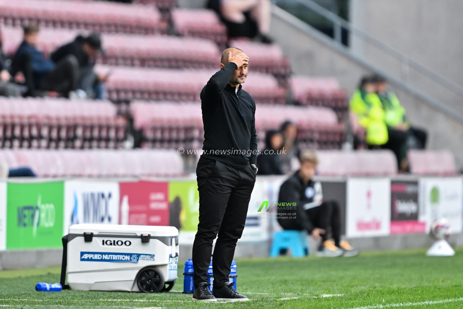 Shaun Maloney manager of Wigan Athletic reacts during the Bristol Street Motors Trophy match Wigan Athletic vs Morecambe at DW Stadium, Wigan, United Kingdom, 3rd September 2024

(Photo by Cody Froggatt/News Images)