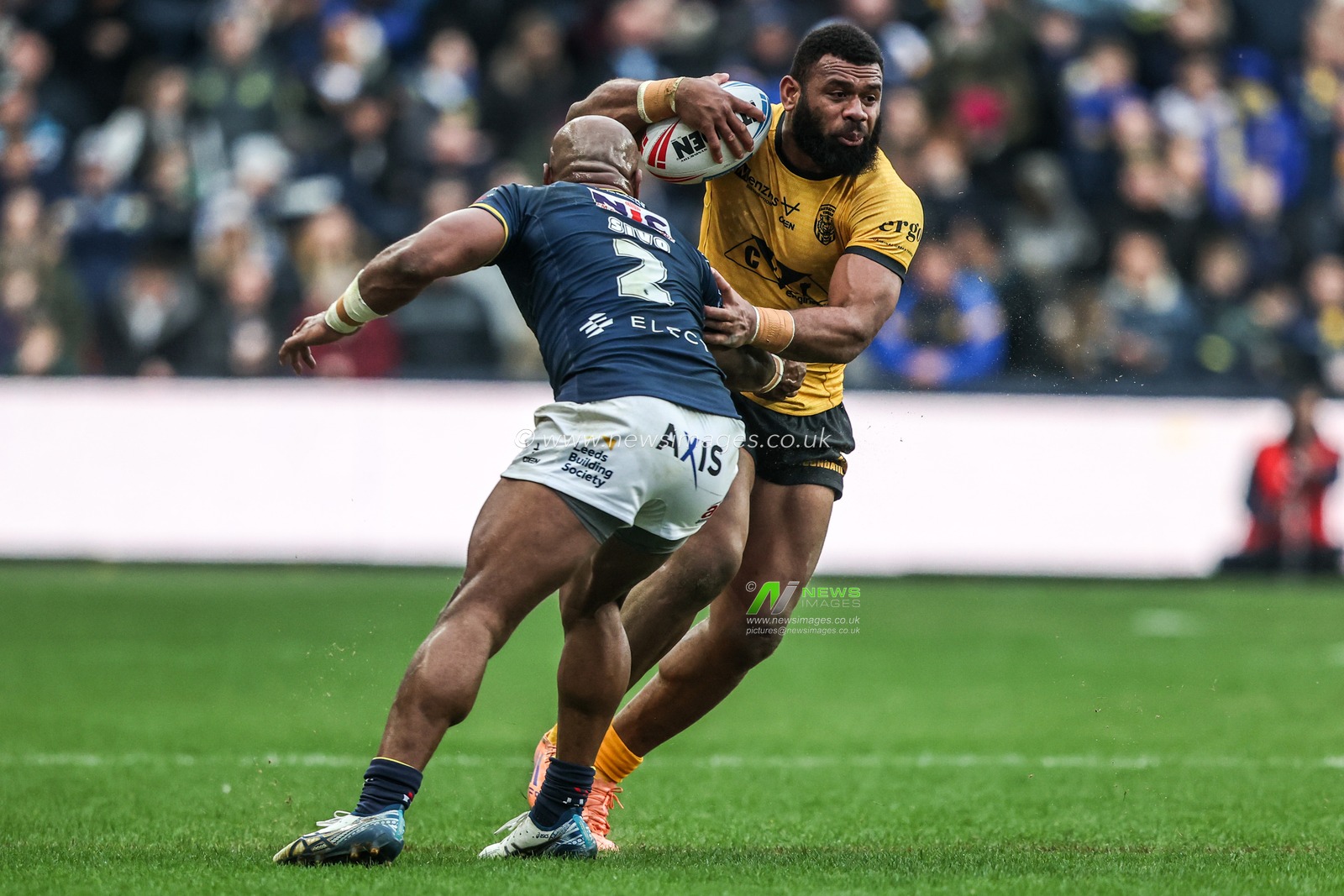 Mikaele Ravalawa of Castleford Tigers is tackled by Maika Sivo of Leeds Rhinos during the Betfred Super League round 4 match Leeds Rhinos vs Castleford Tigers at AMT Headingley Stadium, Leeds, United Kingdom on 08 March 2026

(Photo by Alfie Cosgrove/News Images)