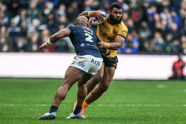 Mikaele Ravalawa of Castleford Tigers is tackled by Maika Sivo of Leeds Rhinos during the Betfred Super League round 4 match Leeds Rhinos vs Castleford Tigers at AMT Headingley Stadium, Leeds, United Kingdom on 08 March 2026

(Photo by Alfie Cosgrove/News Images)