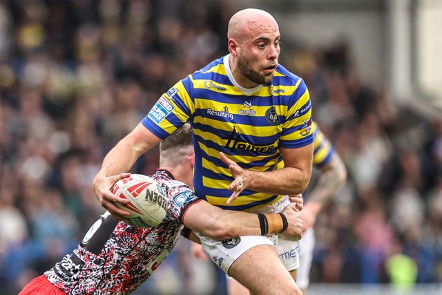 James Harrison of Warrington Wolves is tackled by Adam Cook of Leigh Leopards during the Betfred Super League round 7 match Warrington Wolves vs Leigh Leopards at The Halliwell Jones Stadium, Warrington, United Kingdom on 04 April 2026

(Photo by Alfie Cosgrove/News Images)