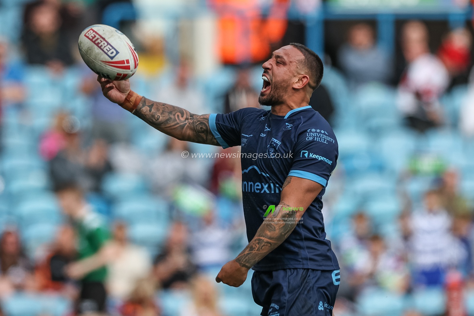 Elliot Minchella of Hull KR throws the ball into the Hull KR fans as he celebrates his try during the Magic Weekend match Catalans Dragons vs Hull KR at Elland Road, Leeds, United Kingdom, 18th August 2024

(Photo by Mark Cosgrove/News Images)