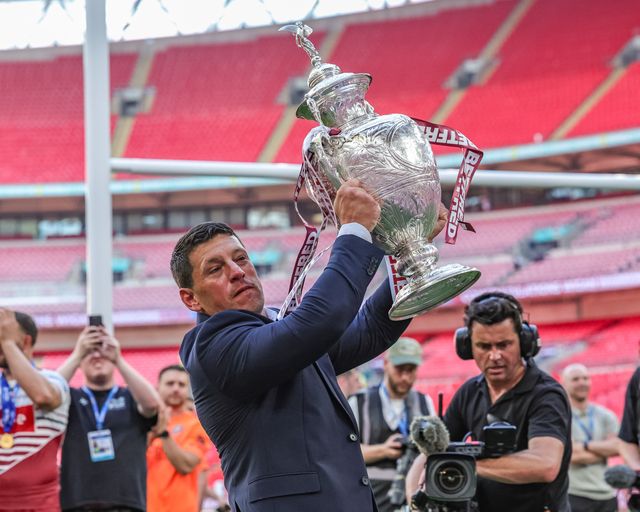 Matt Peet head coach of Wigan Warriors lifts the  Betfred Challenge Cup Trophy up to the fans as he celebrates the win during the Betfred Challenge Cup Final match Wigan Warriors vs Hull KR at Wembley Stadium, London, United Kingdom on 30 May 2026

(Photo by Mark Cosgrove/News Images)