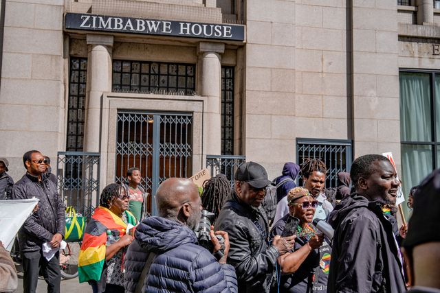 UK-based Zimbabweans gather outside the Zimbabwe Embassy in London on 18 April 2026 to protest the Constitution of Zimbabwe Amendment (No. 3) Bill, which critics say would extend President Mnangagwa’s rule until 2030 and strip citizens of the direct vote for president.

(Photo by Maynard Manyowa/News Images)