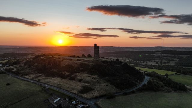 The Sun rises over Victoria Tower, Castle Hill, Huddersfield, United Kingdom, 9th August 2025

(Photo by Alfie Cosgrove/News Images)