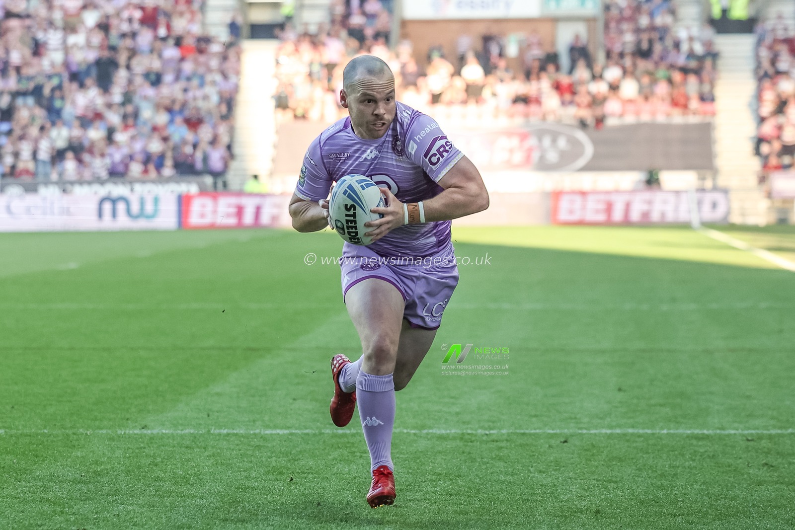 Liam Marshall of Wigan Warriors goes over for a try during the Betfred Super League Round 11 match Wigan Warriors vs Leigh Leopards at The Brick Community Stadium, Wigan, United Kingdom, 16th May 2025

(Photo by Mark Cosgrove/News Images)