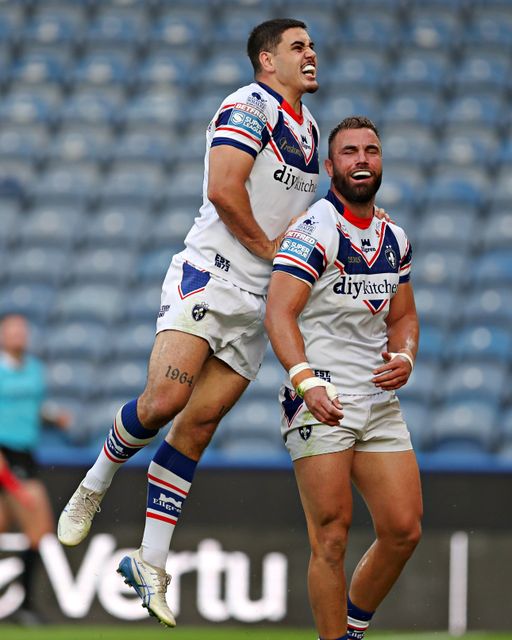 Mike McMeeken of Wakefield Trinity celebrates his try with Caleb Hamlin-Uele of Wakefield Trinity during the Betfred Super League round 19 match Huddersfield Giants vs Wakefield Trinity at the Accu Stadium, Huddersfield, United Kingdom, 18th July 2025

(Photo by Sam Eaden/News Images)