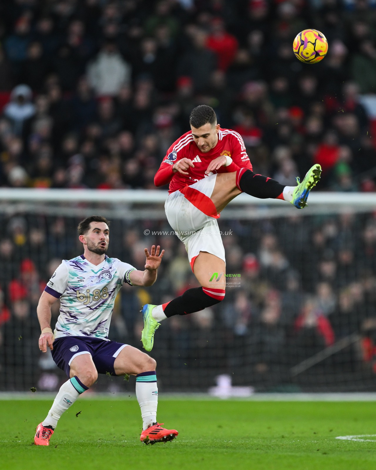 Diogo Dalot of Manchester United clears the ball during the Premier League match Manchester United vs Bournemouth at Old Trafford, Manchester, United Kingdom, 22nd December 2024

(Photo by Craig Thomas/News Images)