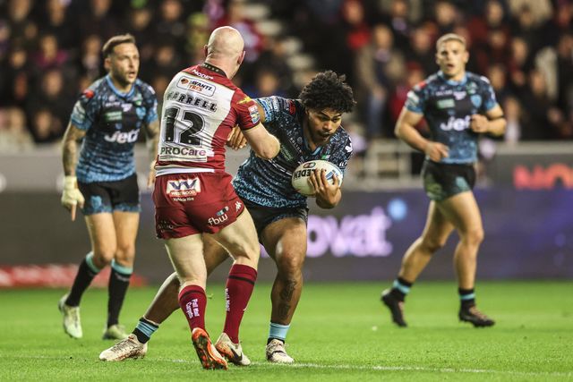 Alec Tuitavake of Leigh Leopards is tackled by Liam Farrell of Wigan Warriors during the Betfred Super League Semi Final 1 match Wigan Warriors vs Leigh Leopards at The Brick Community Stadium, Wigan, United Kingdom, 3rd October 2025

(Photo by Alfie Cosgrove/News Images)