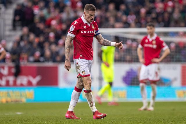 Wrexham's James McClean gives a thumbs up during the Sky Bet League 1 match Wrexham vs Stockport County at SToK Cae Ras, Wrexham, United Kingdom, 22nd March 2025

(Photo by Nik Mesney/News Images)