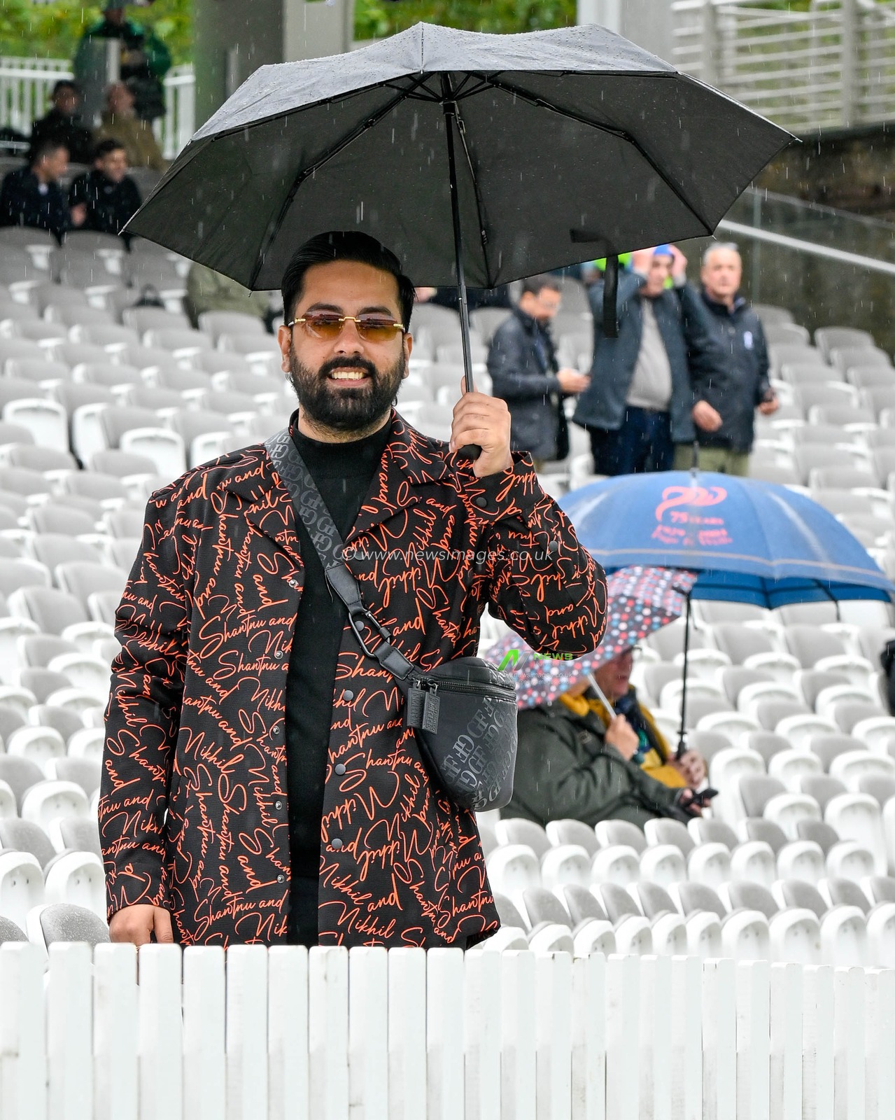 Fan with umbrella during the Third Metro Bank One Day International England v Australia at Lords, London, United Kingdom, 27th September 2024

(Photo by Mark Dunn/News Images)