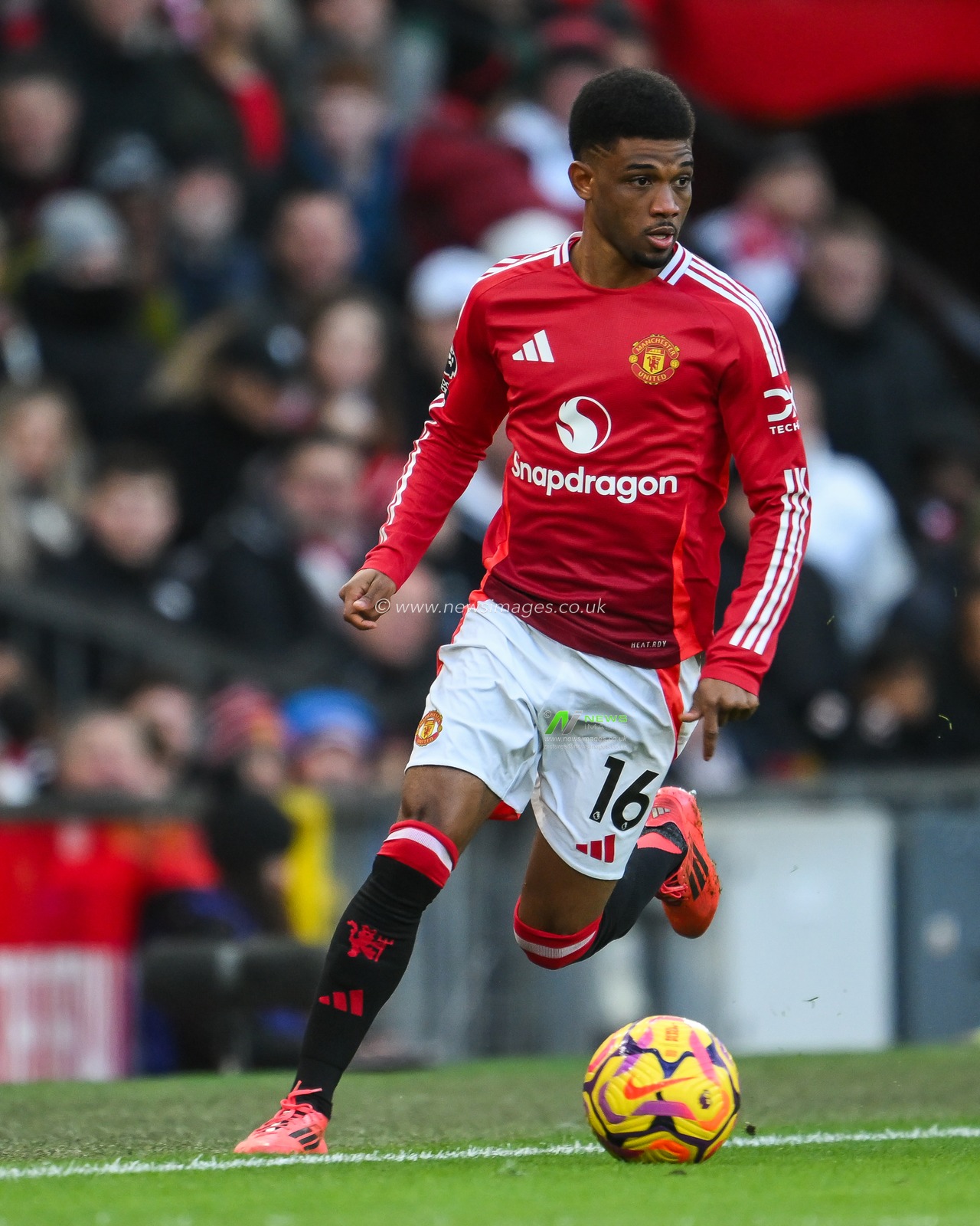 Amad Diallo of Manchester United makes a break with the ball during the Premier League match Manchester United vs Bournemouth at Old Trafford, Manchester, United Kingdom, 22nd December 2024

(Photo by Craig Thomas/News Images)