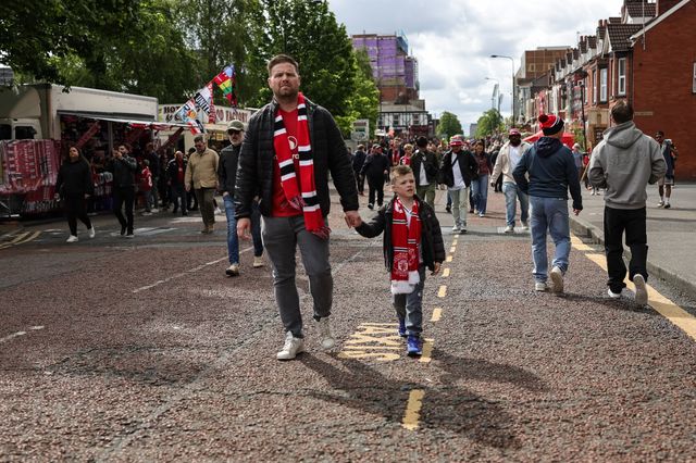 Father and son time as they make their way to the game during the Premier League match Manchester United vs Nottingham Forest at Old Trafford, Manchester, United Kingdom on 17 May 2026

(Photo by Mark Cosgrove/News Images)