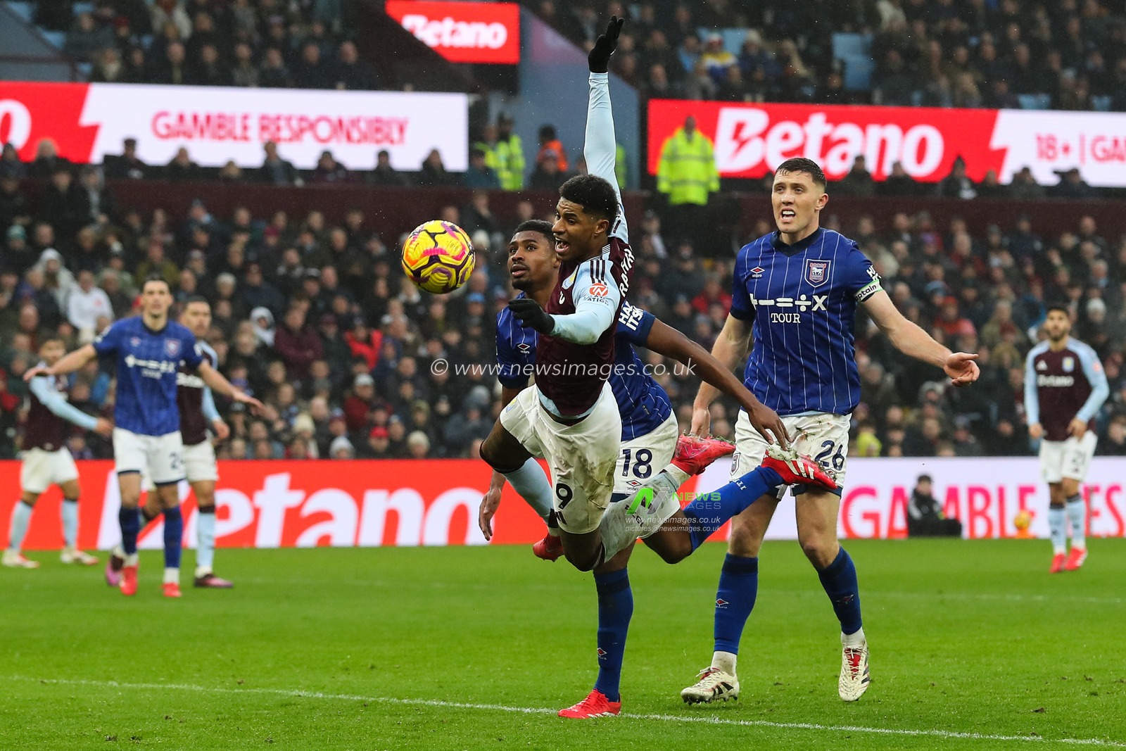 Marcus Rashford of Aston Villa goes down after a coming together with Ben Johnson of Ipswich Town during the Premier League match Aston Villa vs Ipswich Town at Villa Park, Birmingham, United Kingdom, 15th February 2025

(Photo by Gareth Evans/News Images)