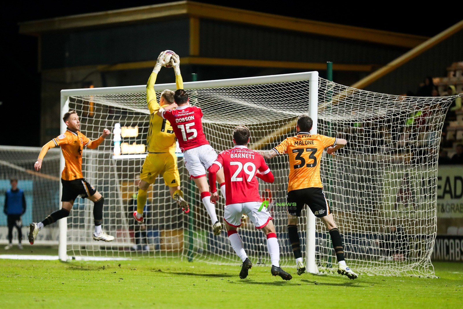 Nathan Bishop of Cambridge United makes a save during the Sky Bet League 1 match Cambridge United vs Wrexham at Abbey Stadium, Cambridge, United Kingdom, 1st April 2025

(Photo by Izzy Poles/News Images)