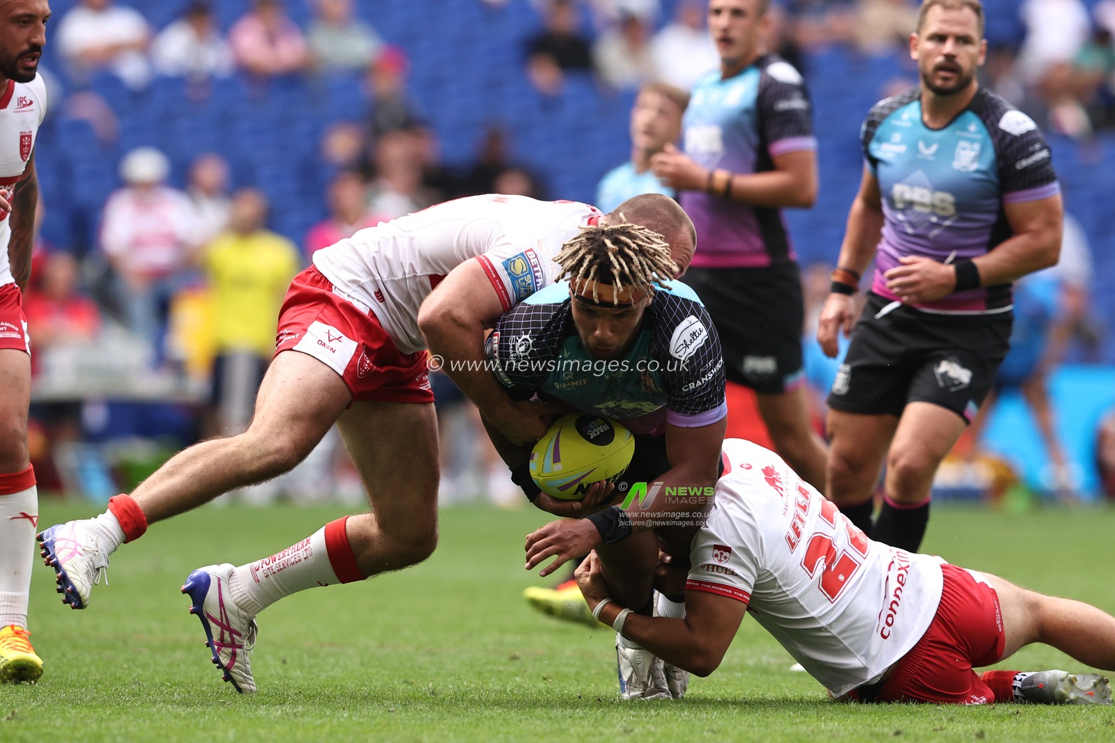 Hugo Salabio of Hull FC is tackled by Bill Leyland of Hull KR during the Betfred Super League Magic Weekend match Hull KR vs Hull FC at Hill Dickinson Stadium, Liverpool, United Kingdom on 04 July 2026

(Photo by Alfie Cosgrove/News Images)