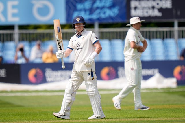 Harry Came of Derbyshire celebrates reaching his 50 by raising his bat to acknowledge the dressing room cheering his half century during the County Championship Division Two Derbyshire vs Northamptonshire day one match at The Central Co-Op County Ground, Derby, United Kingdom on 08 May 2026

(Photo by Maynard Manyowa/News Images)